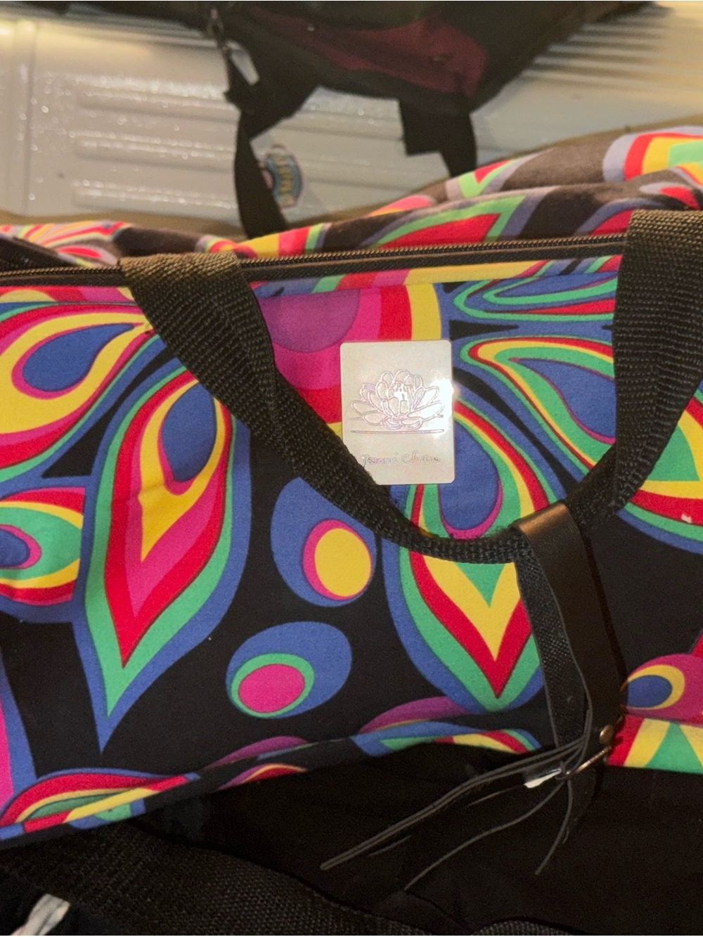 Vibrant Multicolor Travel Duffel Bag with Black Handles
